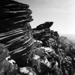 Roaches Western Edge with snow blown into grooves in rocks, near Leek, Peak District; 326206 Dave Butcher